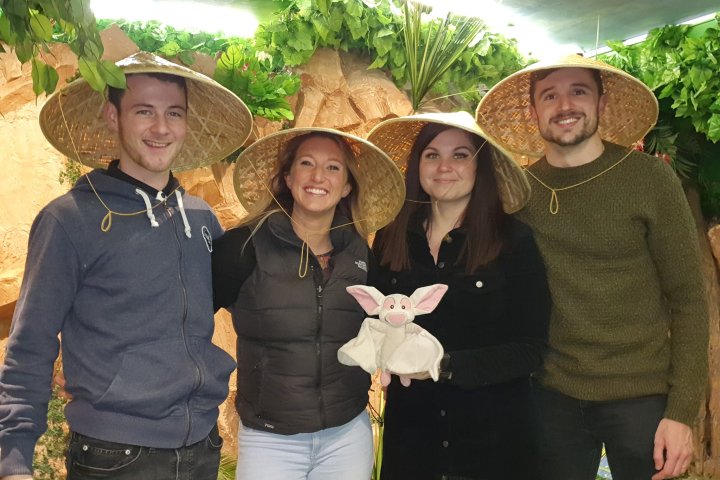 a group of people posing for a photo